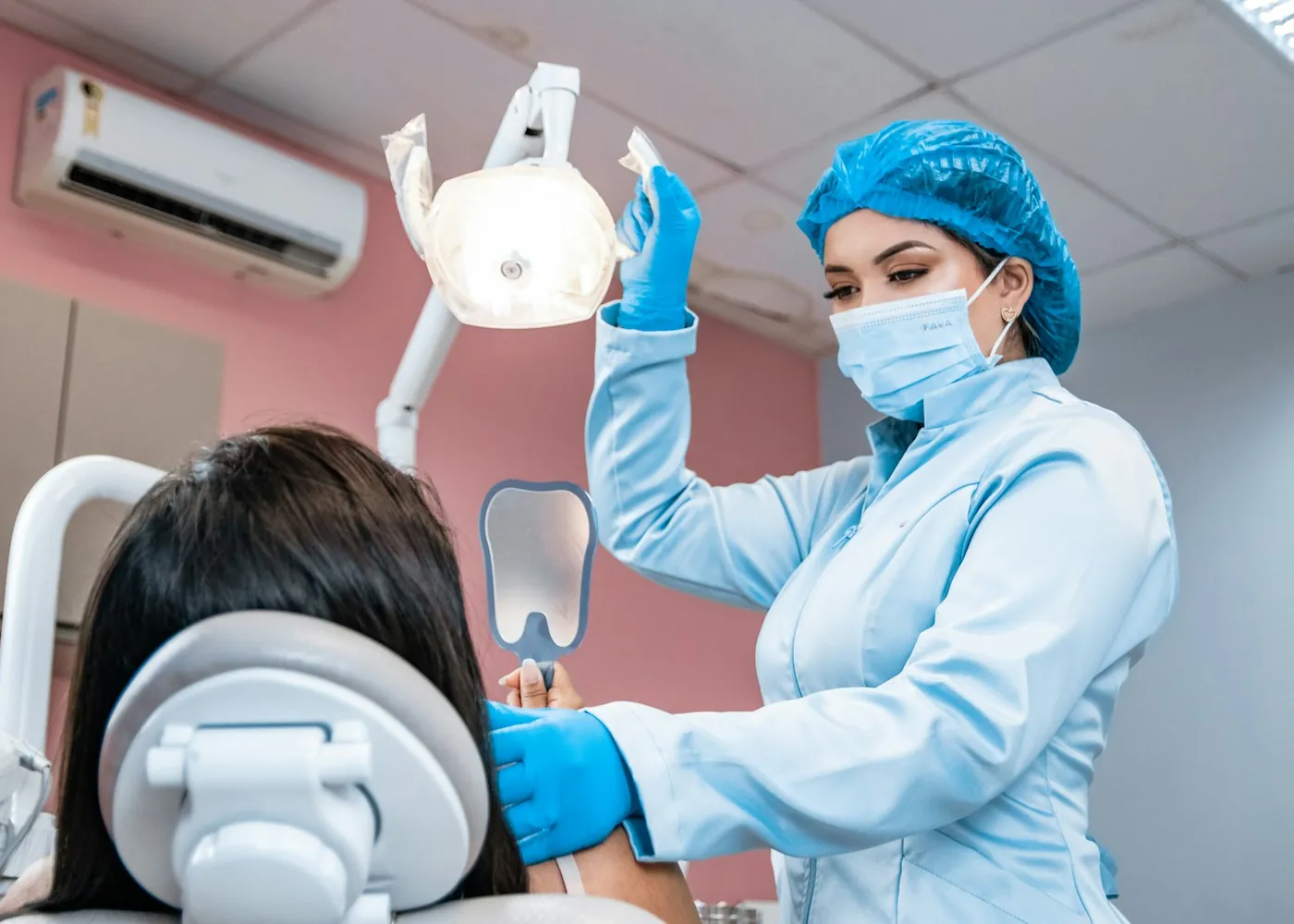 A dentist examining a patient