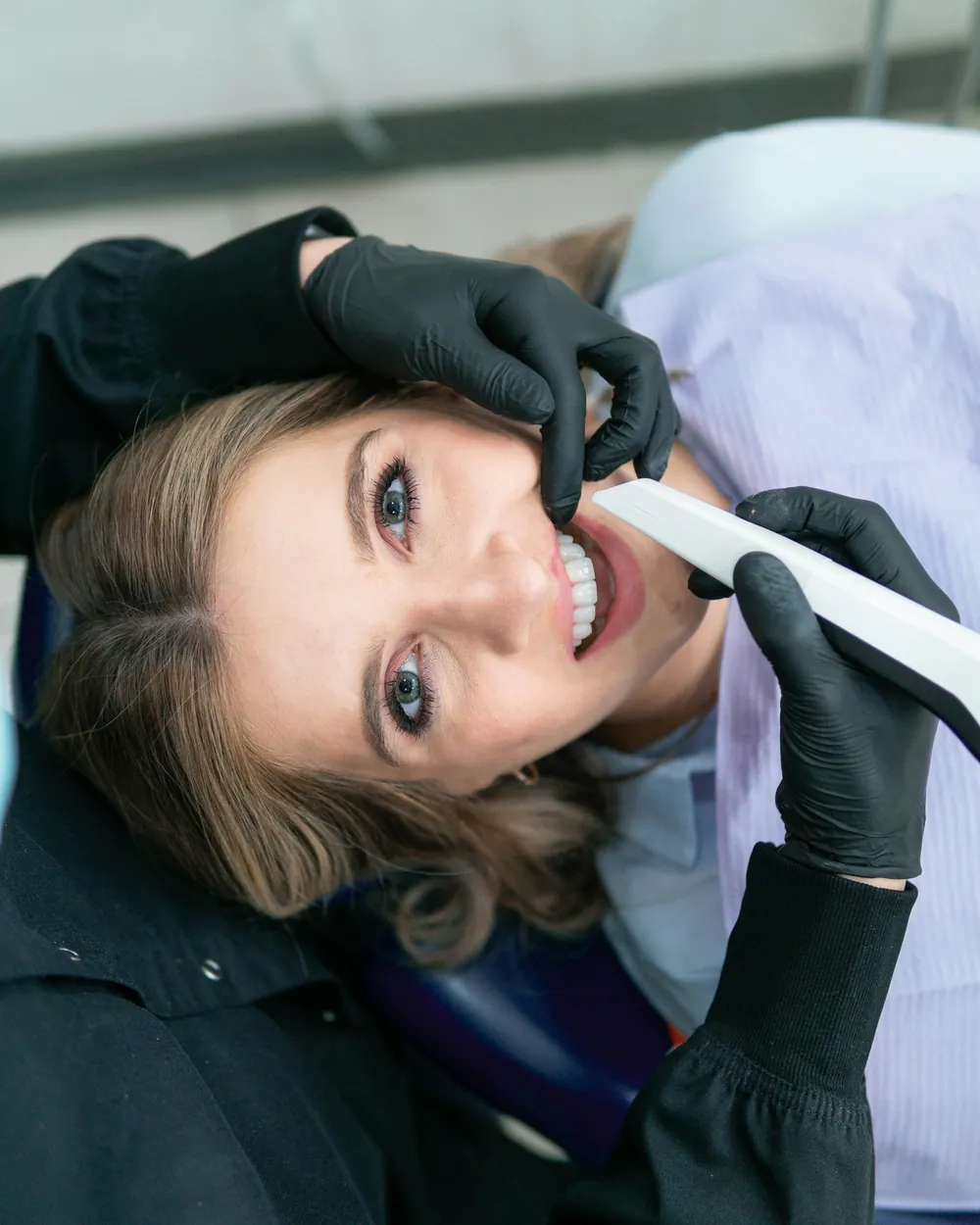 A smiling patient after a check-up